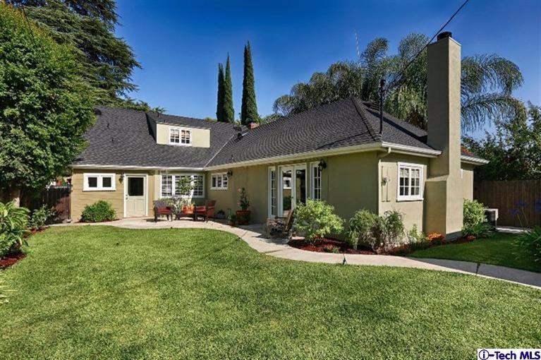 1915 Cañada Boulevard Glendale, CA 91208 - Photo 35 of 42 a front view of a house with a garden and plants