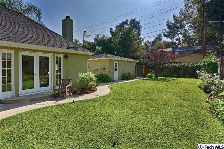 1915 Cañada Boulevard Glendale, CA 91208 - Photo 37 of 42 a front view of a house with garden and porch