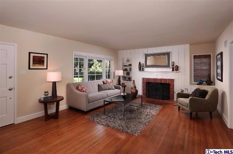 1915 Cañada Boulevard Glendale, CA 91208 - Photo 9 of 42 a living room with furniture and a fireplace