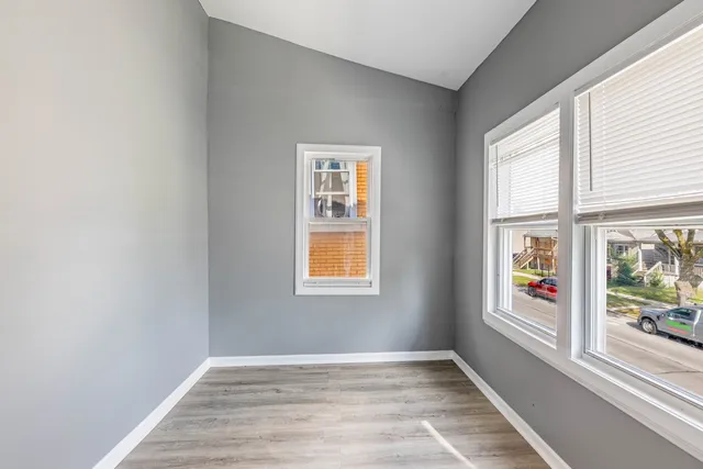 an empty room with windows