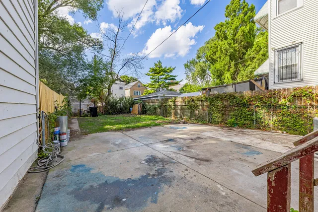 a view of a house with a street
