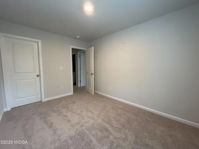 an empty room with an entryway