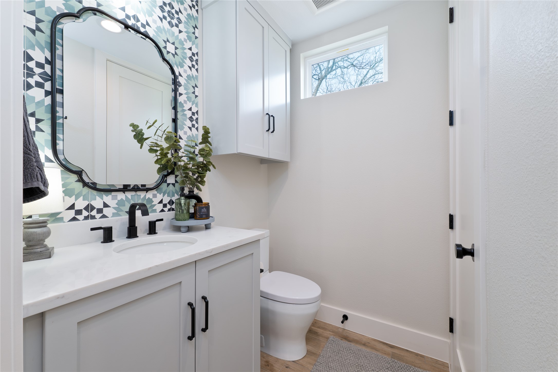 2004 Chestnut Avenue, Unit 1 Austin, TX 78722 - Photo 15 of 39 Downstairs half bath