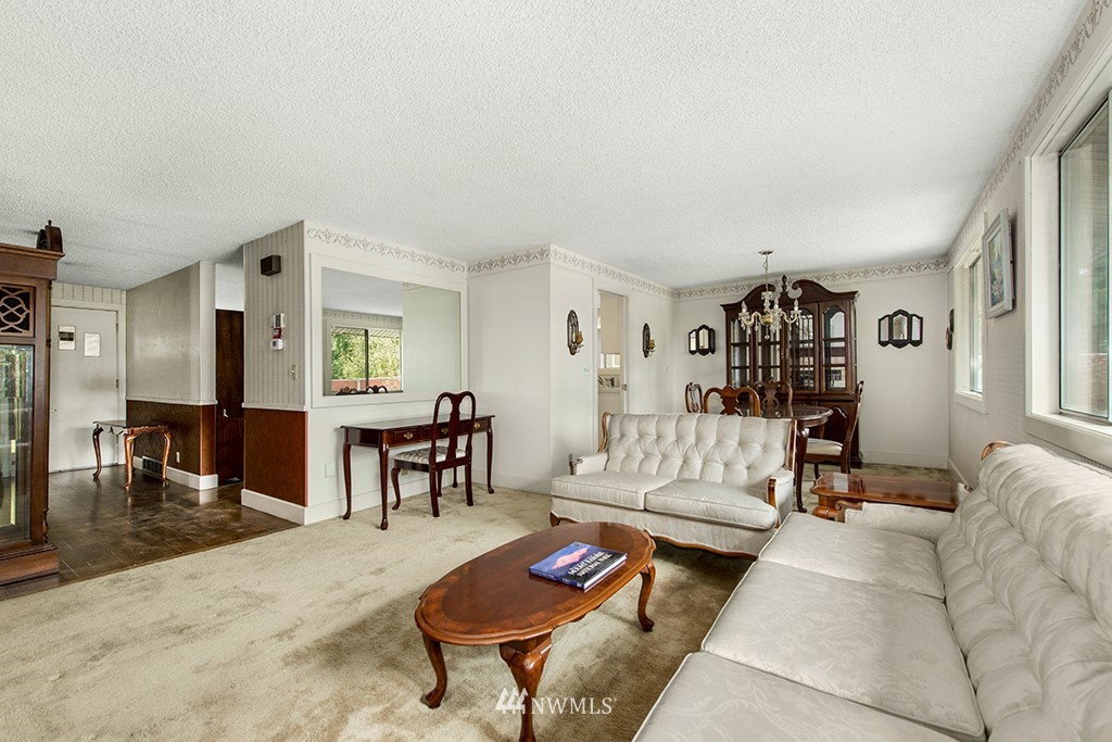 807 Union Street Northeast Renton, WA 98056 - Photo 12 of 38 a living room with furniture or couch and a dining table