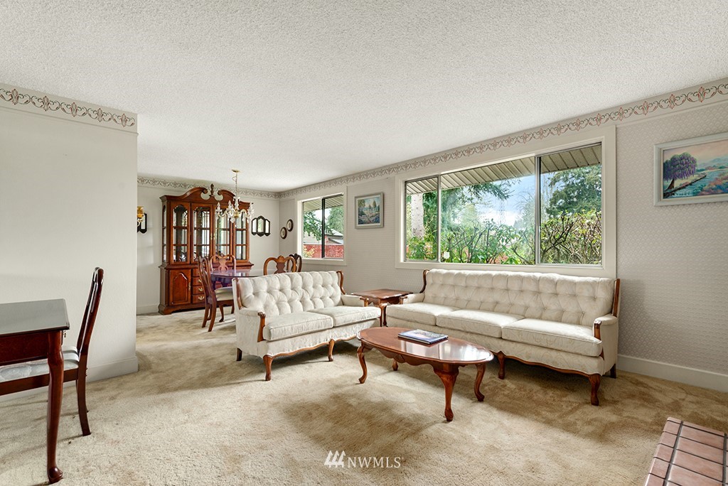 807 Union Street Northeast Renton, WA 98056 - Photo 13 of 38 a living room with furniture and a window