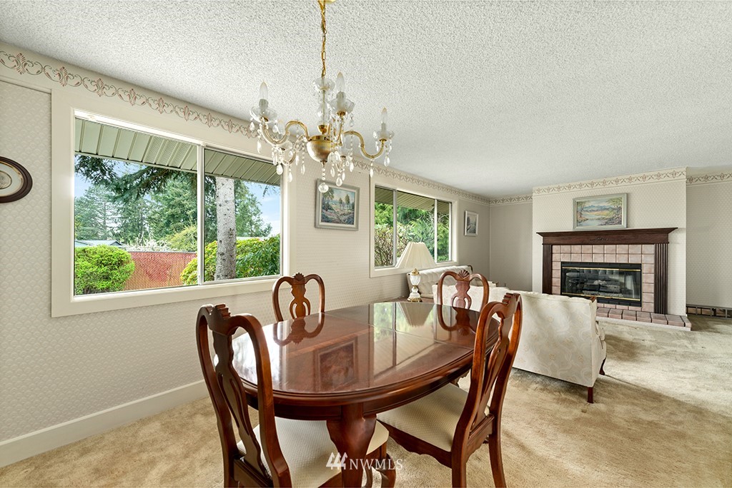 807 Union Street Northeast Renton, WA 98056 - Photo 14 of 38 a view of a dining room with furniture window and outside view