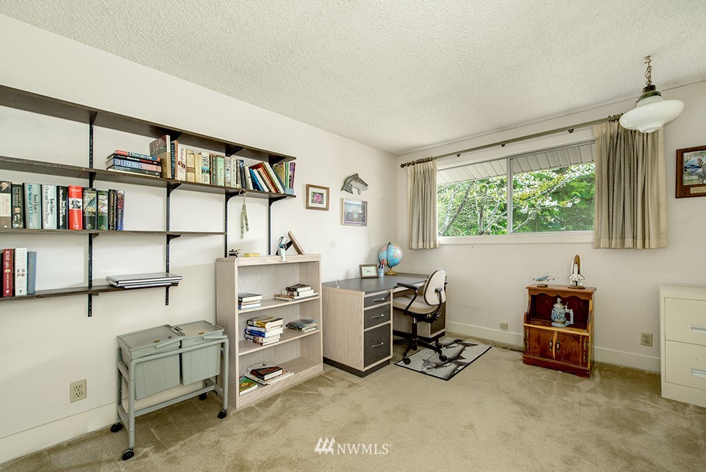 807 Union Street Northeast Renton, WA 98056 - Photo 21 of 38 a view of a workspace with furniture and a window