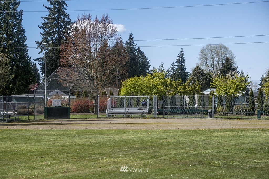 807 Union Street Northeast Renton, WA 98056 - Photo 29 of 38 a front view of a house with a yard