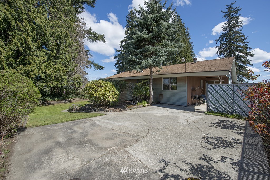 807 Union Street Northeast Renton, WA 98056 - Photo 35 of 38 a view of a house with a yard and garage