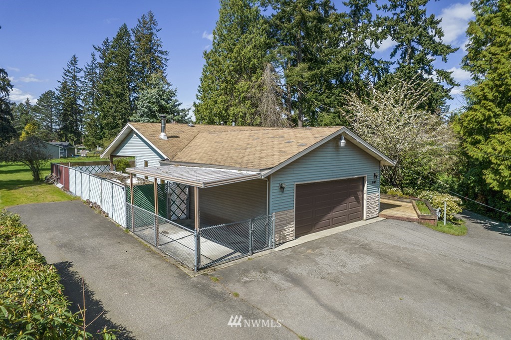807 Union Street Northeast Renton, WA 98056 - Photo 38 of 38 a view of a house with wooden fence