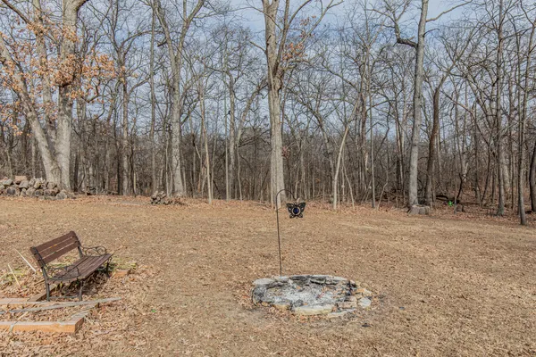 a backyard of a house with trees
