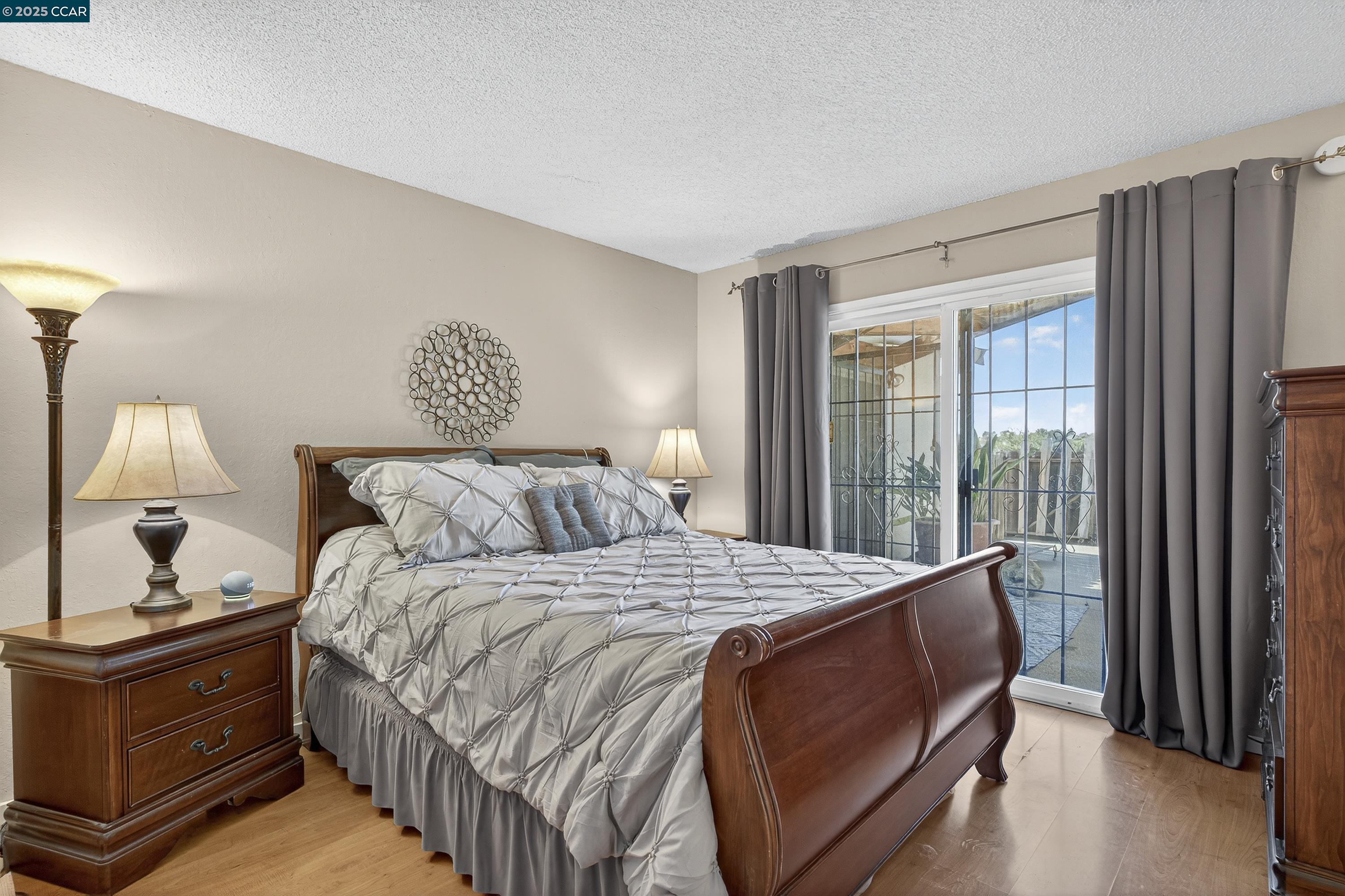 817 Ketch Court Rodeo, CA 94572 - Photo 22 of 45 a bedroom with a bed and a window