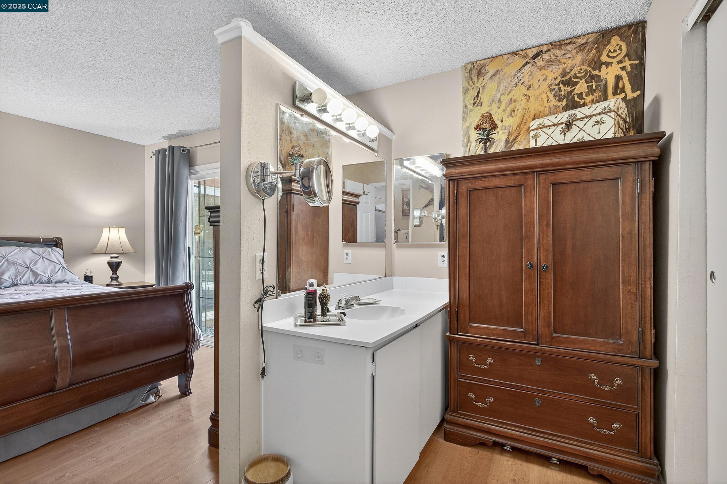 817 Ketch Court Rodeo, CA 94572 - Photo 25 of 45 a bathroom with a sink and a mirror