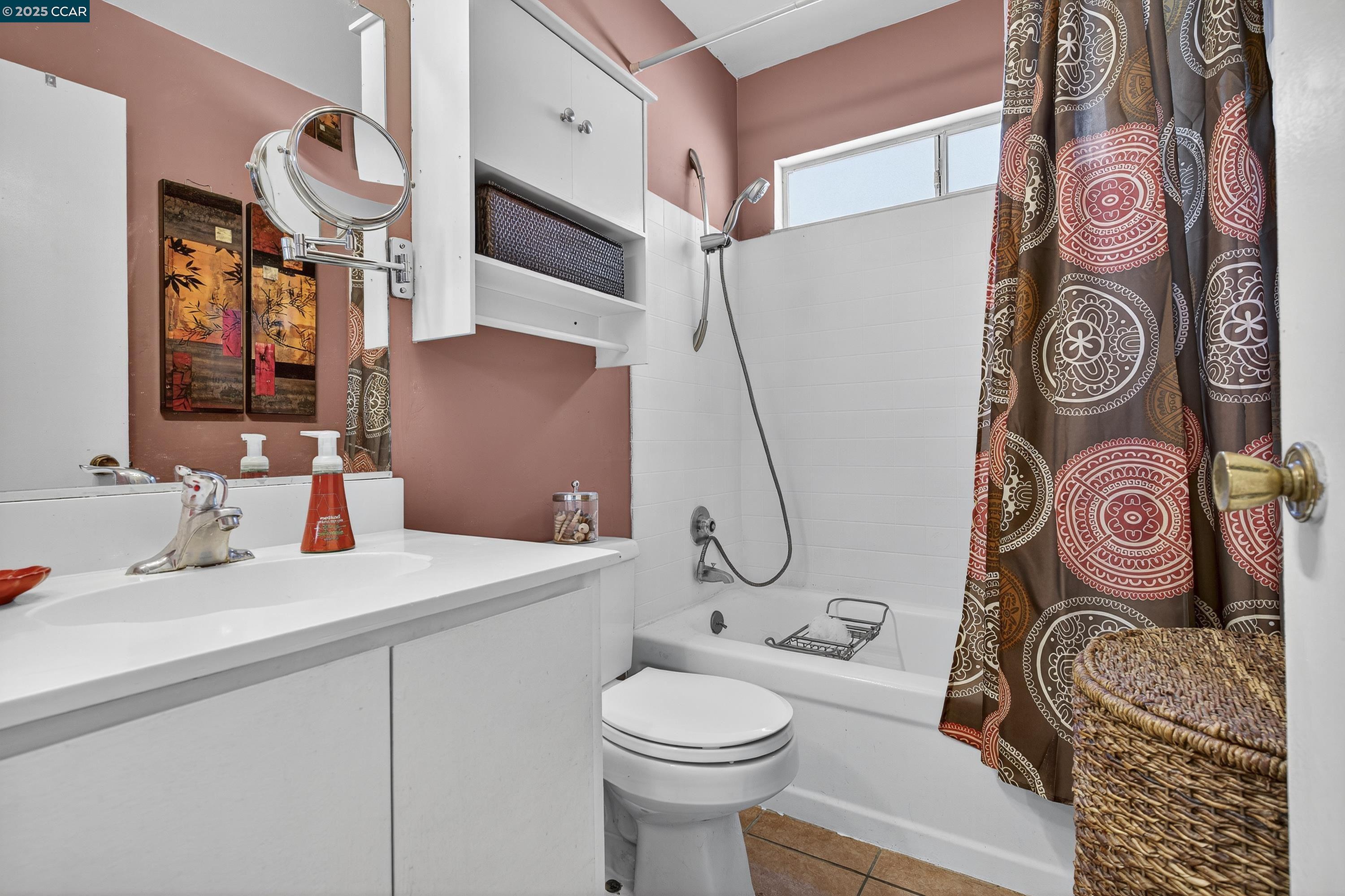 817 Ketch Court Rodeo, CA 94572 - Photo 32 of 45 a bathroom with a sink a toilet and shower