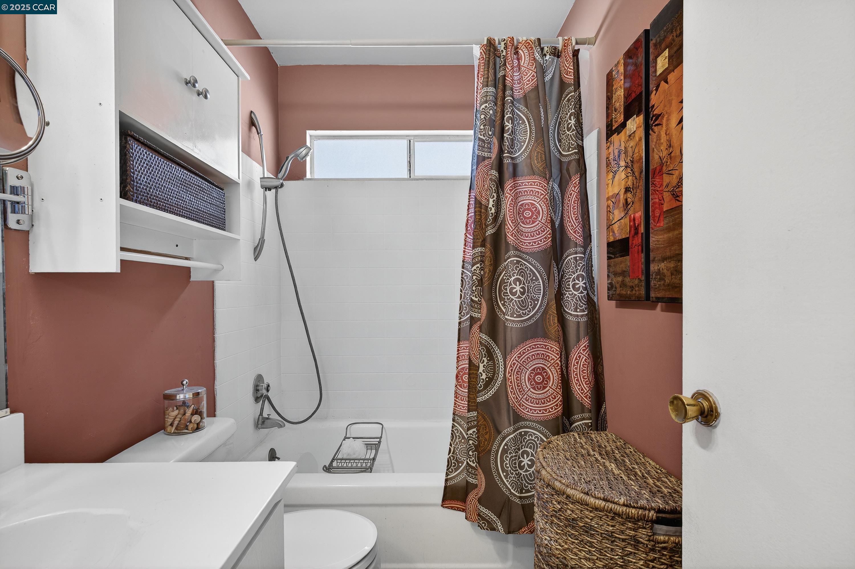 817 Ketch Court Rodeo, CA 94572 - Photo 33 of 45 a bathroom with a sink and a mirror