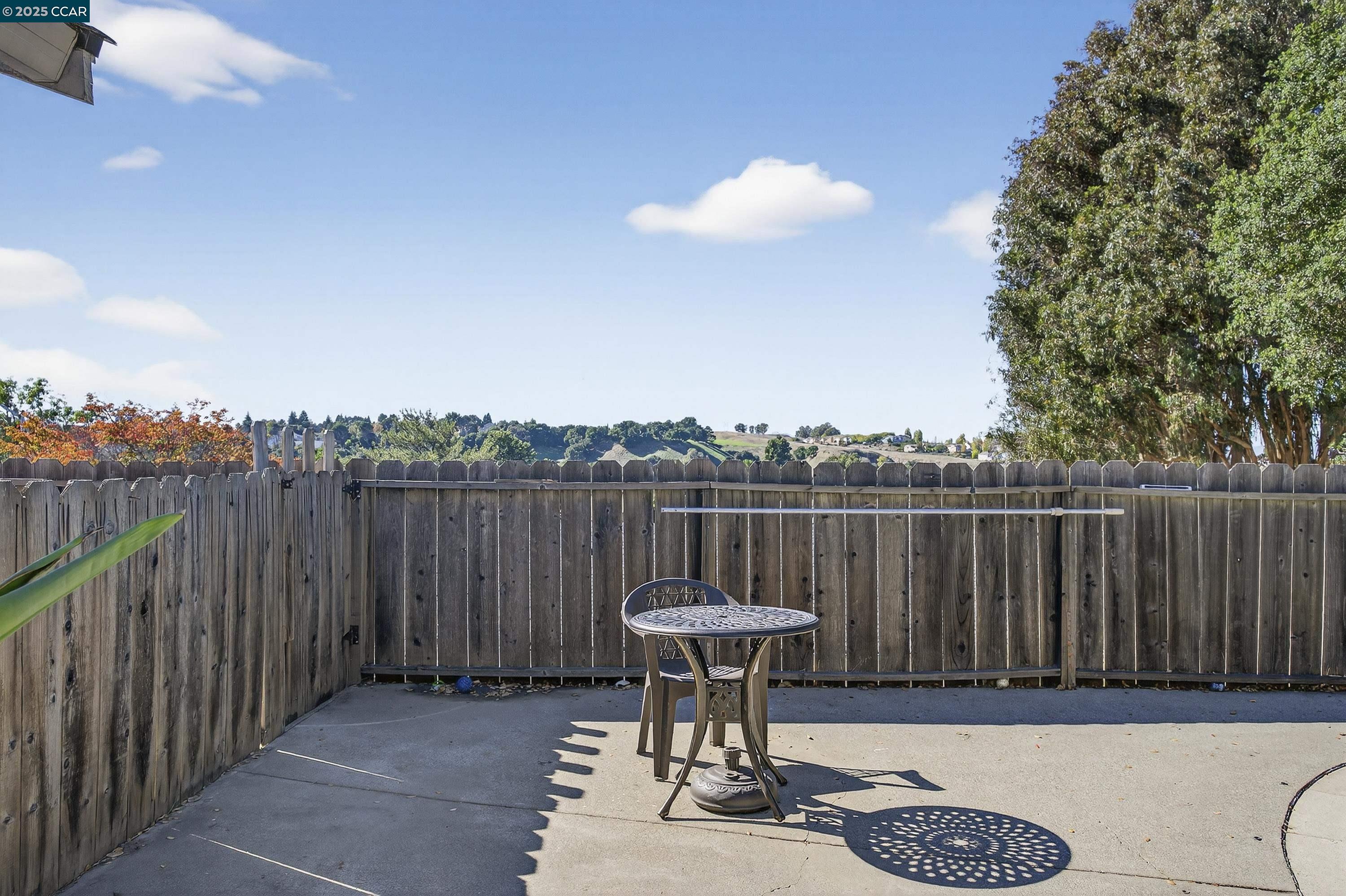 817 Ketch Court Rodeo, CA 94572 - Photo 37 of 45 a view of a roof deck with table and chairs