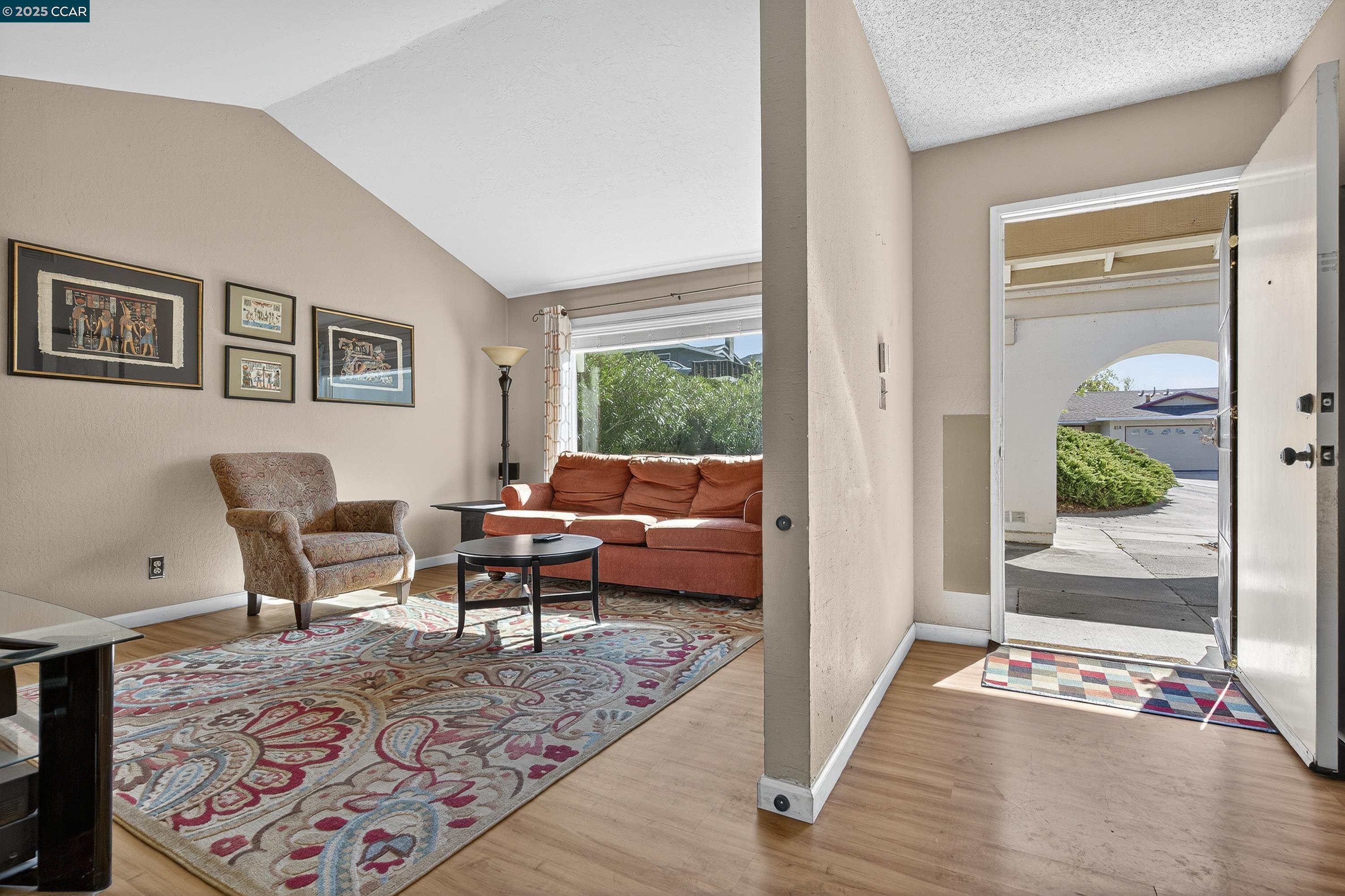 817 Ketch Court Rodeo, CA 94572 - Photo 4 of 45 a living room with furniture and a window