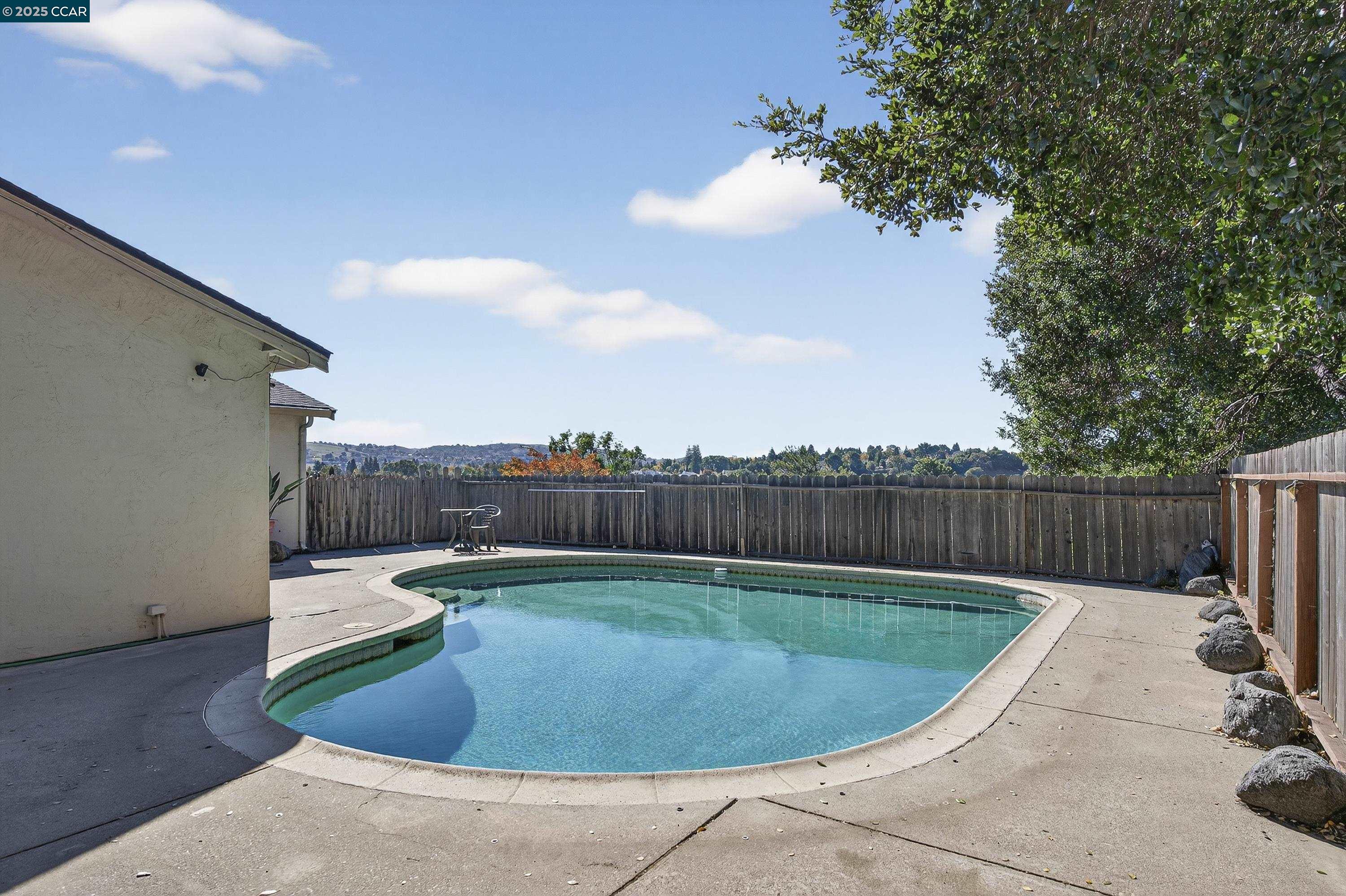 817 Ketch Court Rodeo, CA 94572 - Photo 41 of 45 a view of a swimming pools under an umbrella