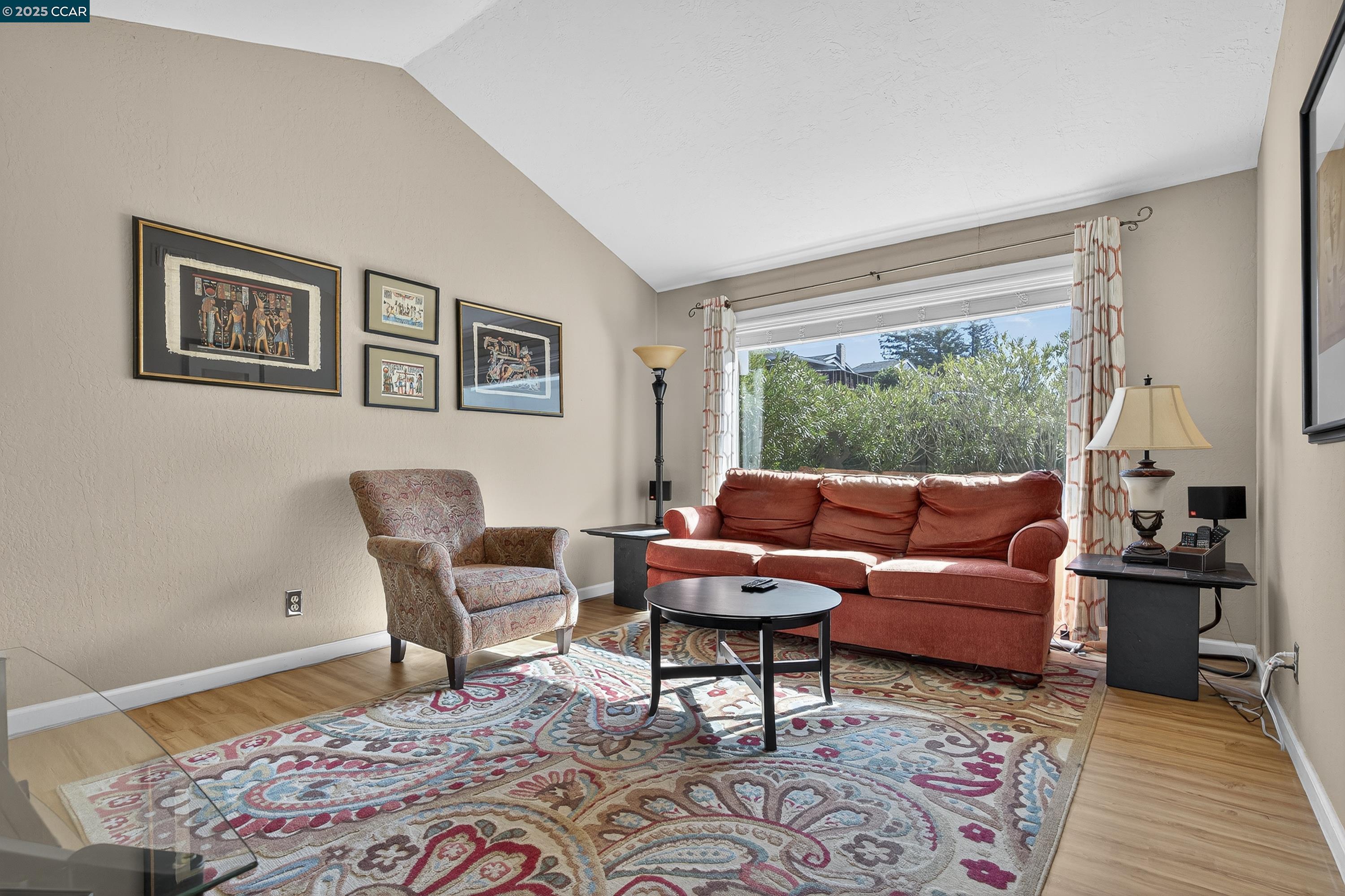 817 Ketch Court Rodeo, CA 94572 - Photo 7 of 45 a living room with furniture and a rug