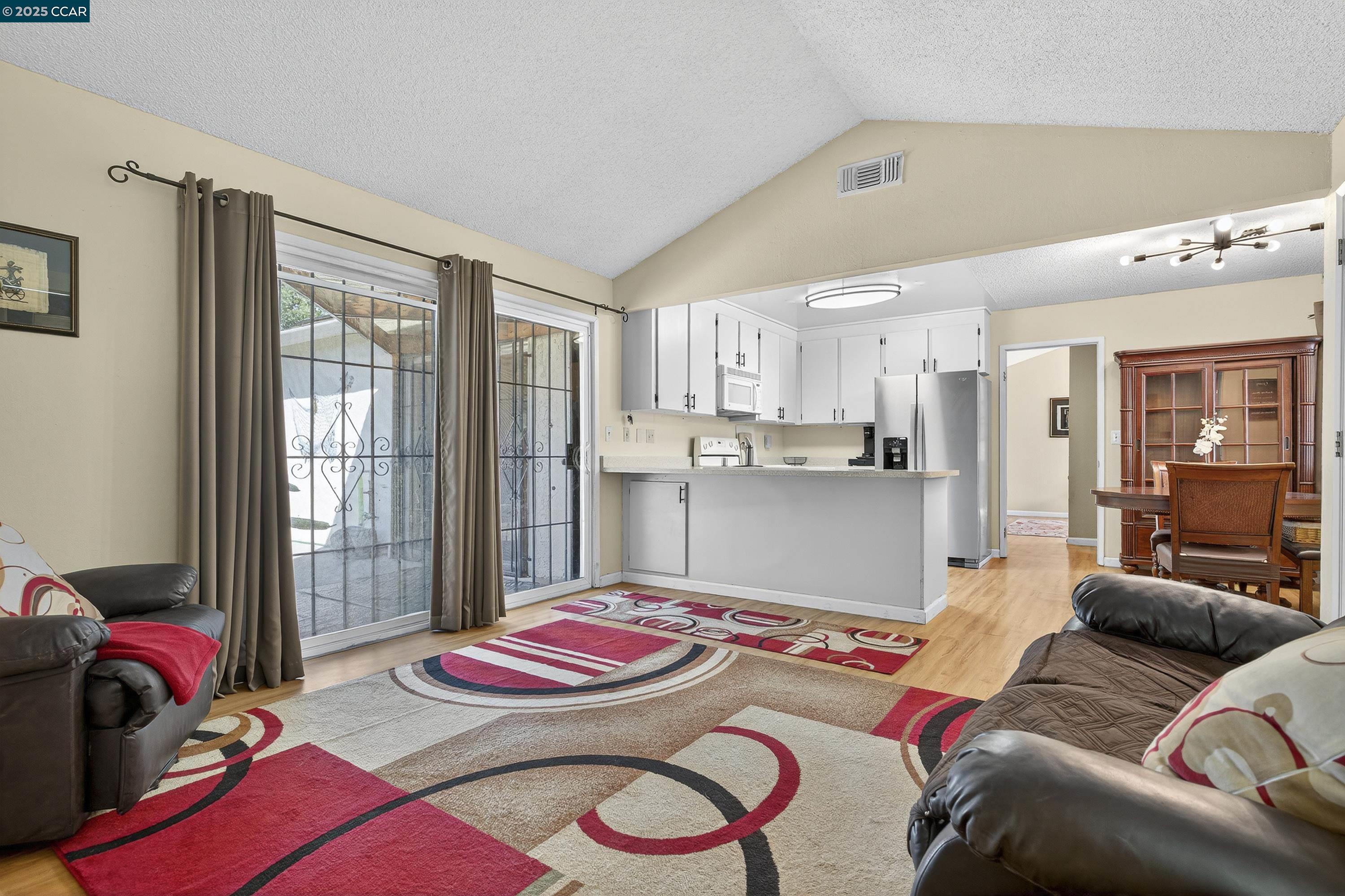 817 Ketch Court Rodeo, CA 94572 - Photo 9 of 45 a bedroom with a bed and wooden floor