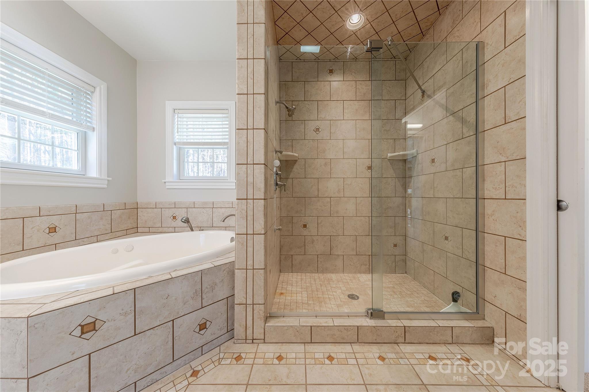 2174 McKee Road Fort Mill, SC 29708 - Photo 20 of 48 a bathroom with a shower sink and mirror