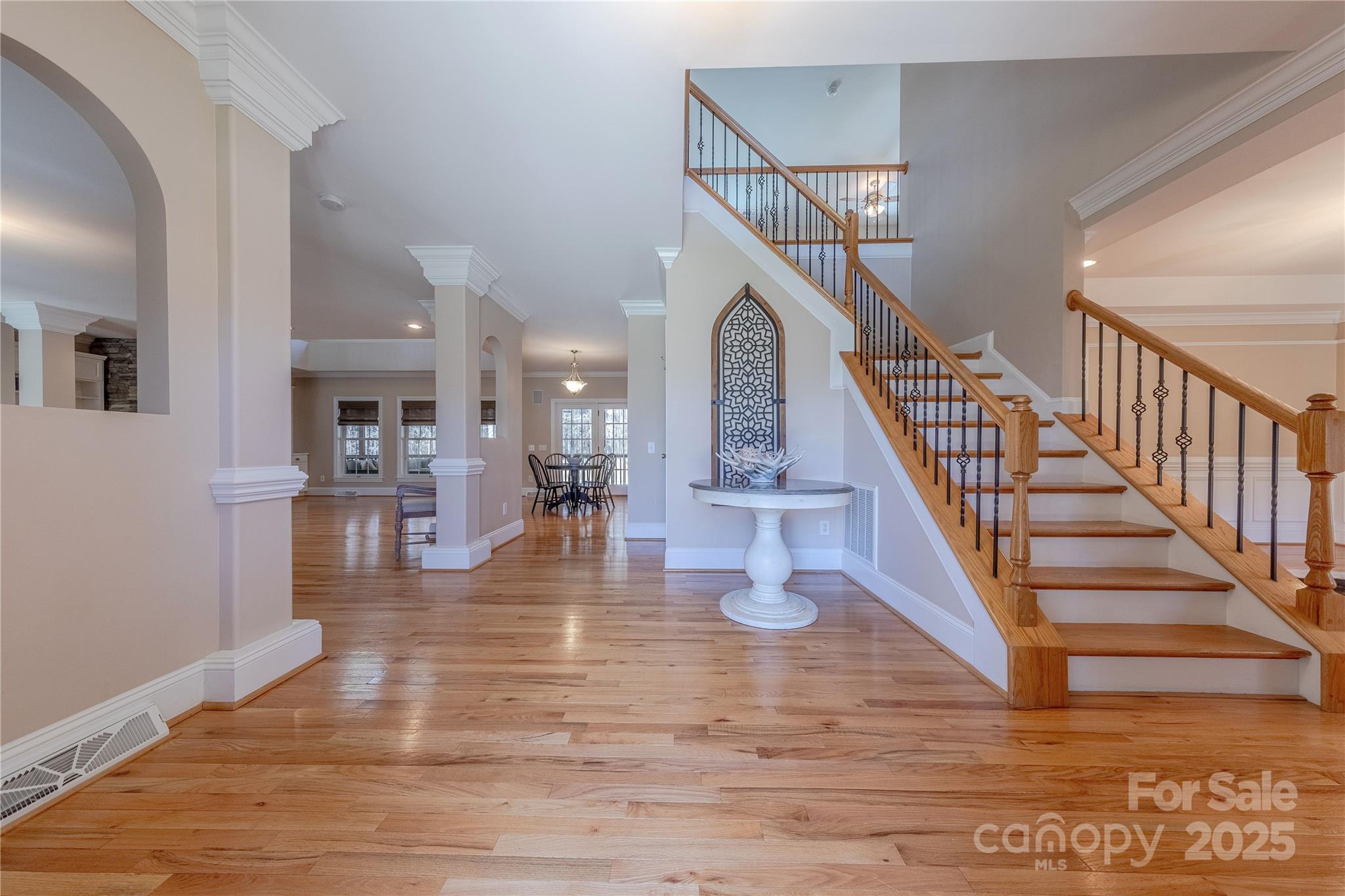 2174 McKee Road Fort Mill, SC 29708 - Photo 3 of 48 a view of entryway and hall with wooden floor