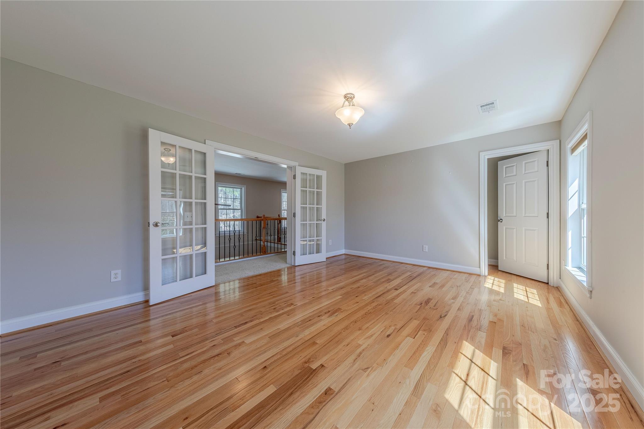 2174 McKee Road Fort Mill, SC 29708 - Photo 34 of 48 a view of empty room with wooden floor