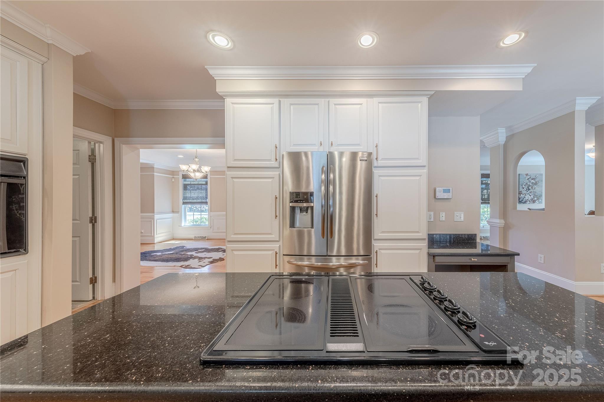 2174 McKee Road Fort Mill, SC 29708 - Photo 8 of 48 a kitchen with kitchen island a counter top space appliances and cabinets