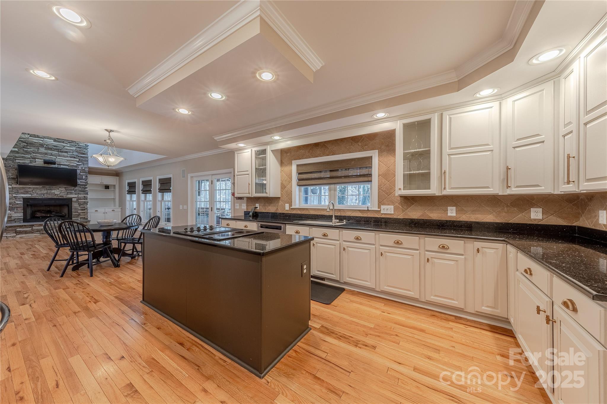 2174 McKee Road Fort Mill, SC 29708 - Photo 9 of 48 a kitchen with stainless steel appliances granite countertop a stove and cabinets