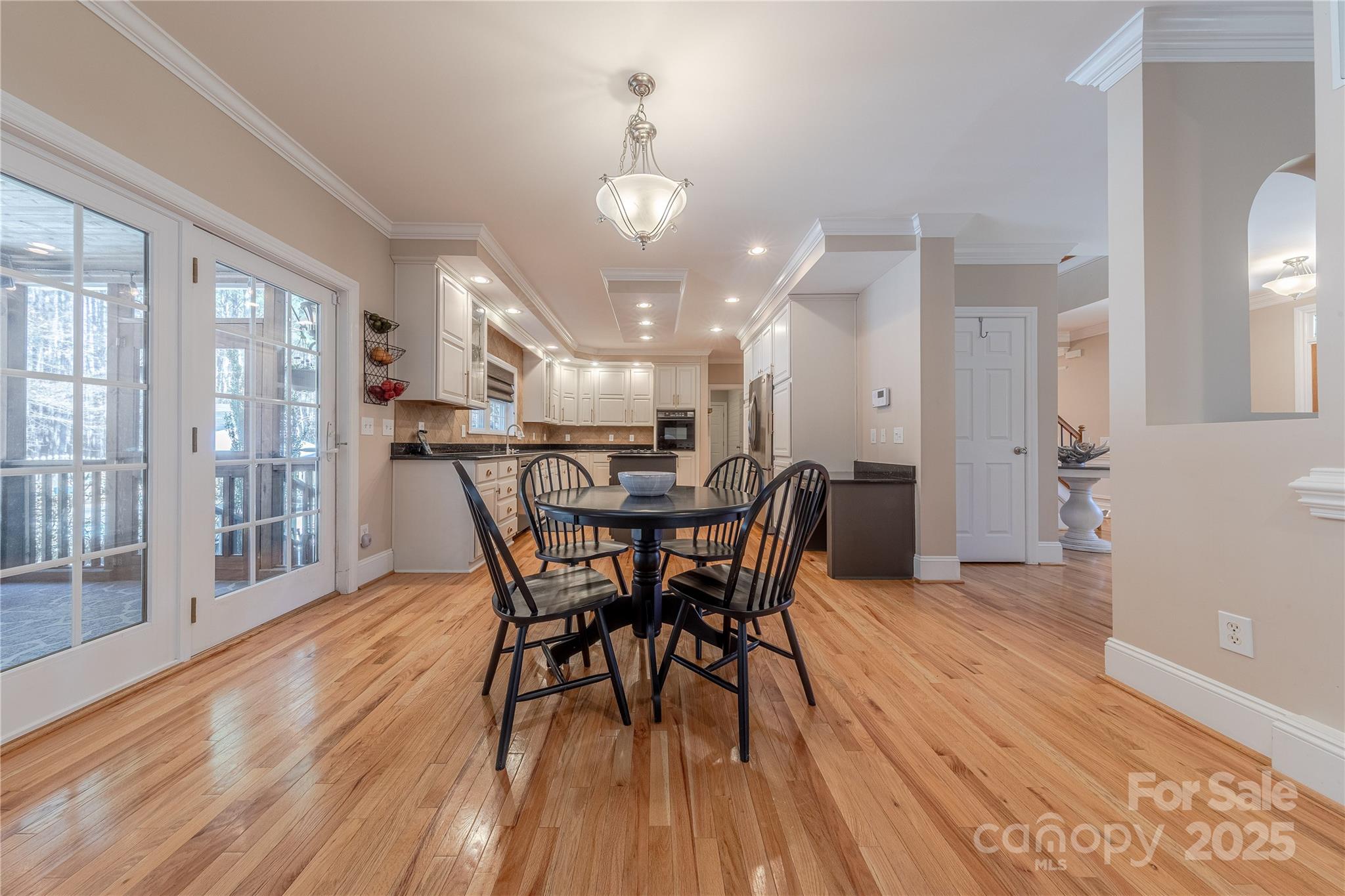2174 McKee Road Fort Mill, SC 29708 - Photo 10 of 48 a view of a dining room with furniture and wooden floor