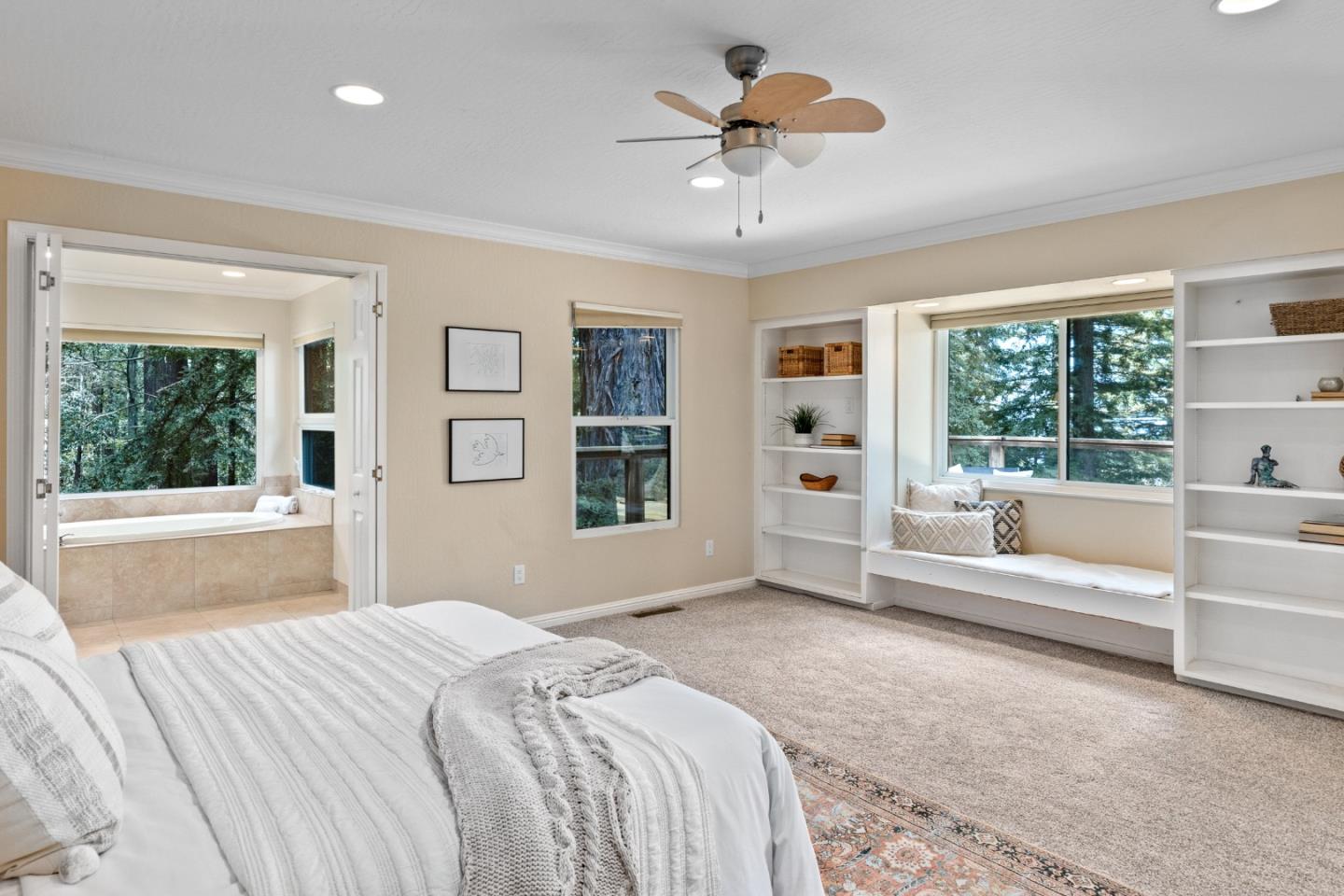 394 Summit Road Watsonville, CA 95076 - Photo 14 of 26 a spacious bedroom with a large bed and a large window