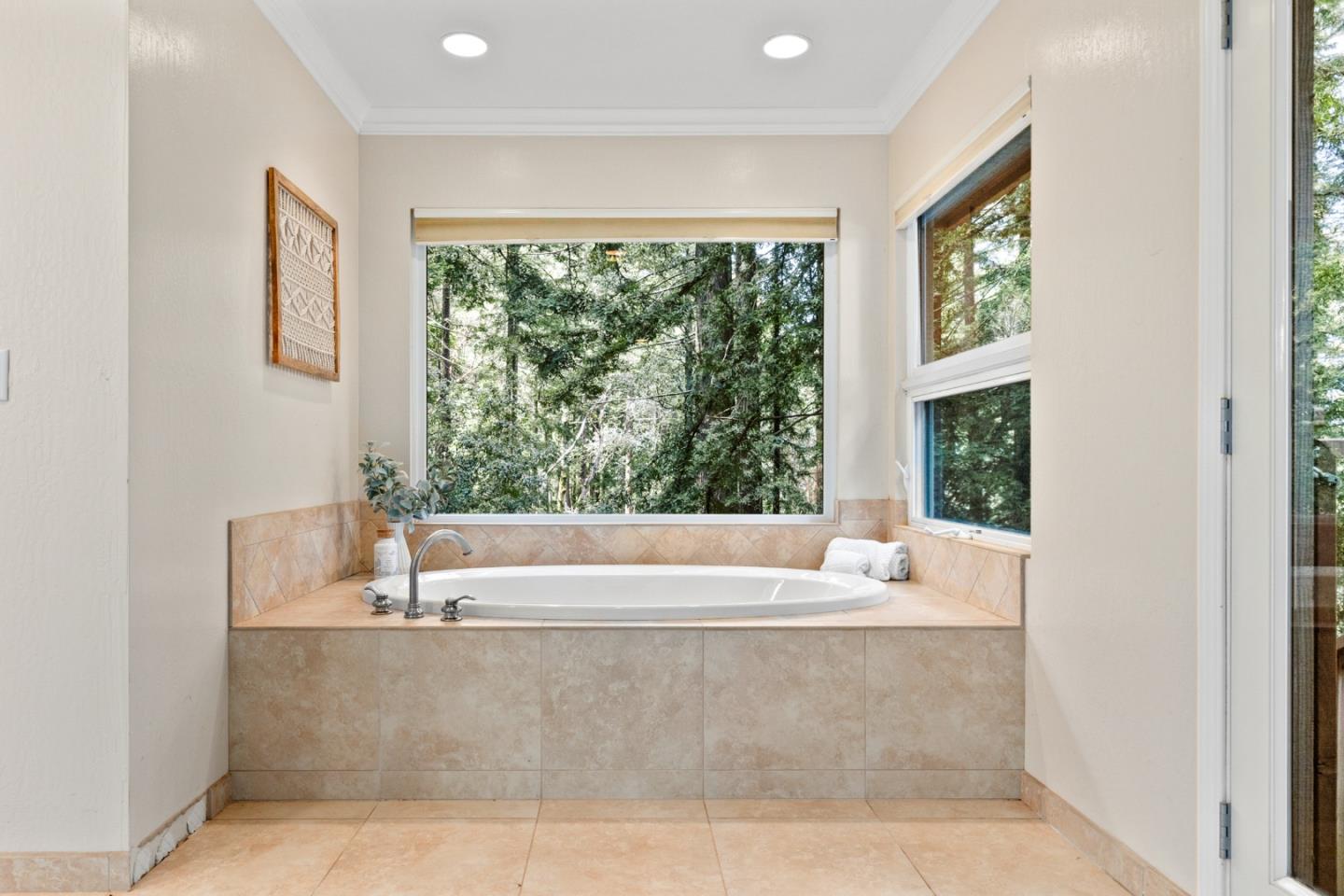 394 Summit Road Watsonville, CA 95076 - Photo 15 of 26 a bath tub sitting in a bathroom next to a window
