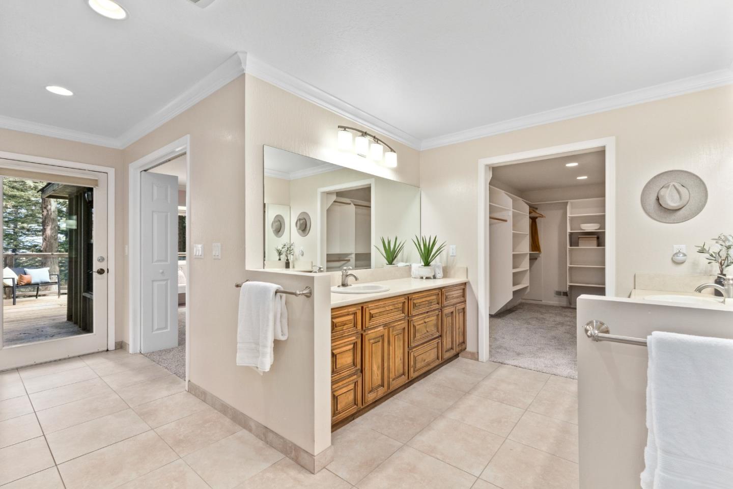 394 Summit Road Watsonville, CA 95076 - Photo 16 of 26 a large bathroom with a double vanity sink and a mirror