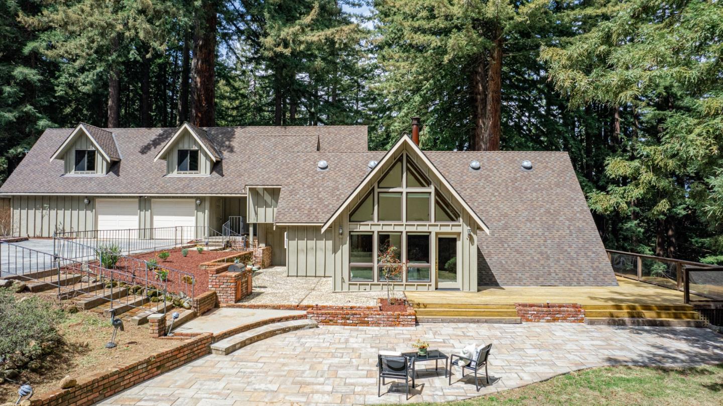 394 Summit Road Watsonville, CA 95076 - Photo 2 of 26 a front view of a house with a yard