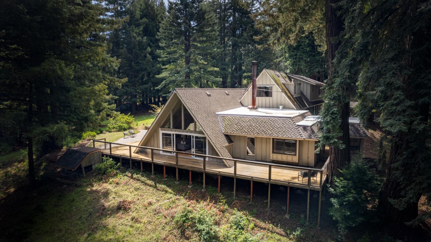 394 Summit Road Watsonville, CA 95076 - Photo 3 of 26 a aerial view of a house with swimming pool next to a yard