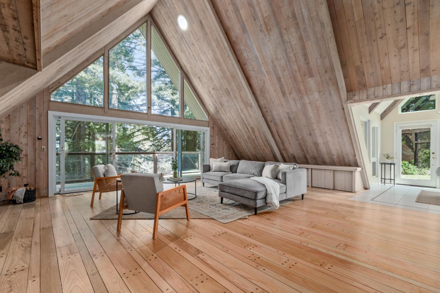 394 Summit Road Watsonville, CA 95076 - Photo 4 of 26 a living room with furniture and a large window