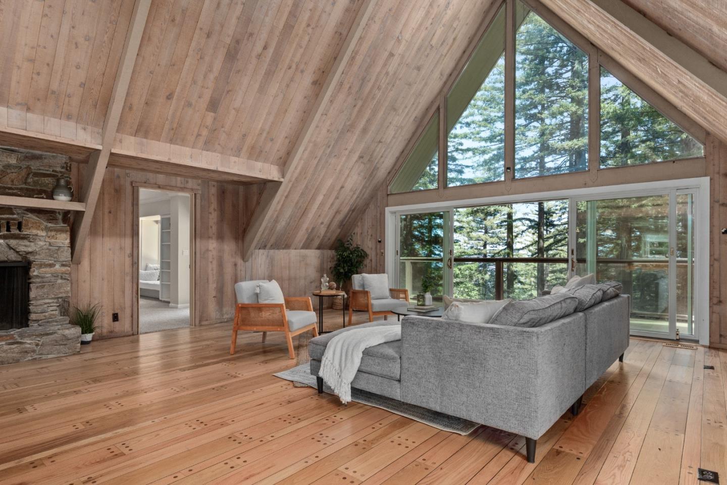 394 Summit Road Watsonville, CA 95076 - Photo 6 of 26 a living room with furniture and a large window