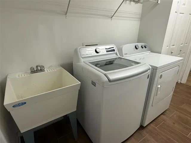 a utility room with dryer and washer