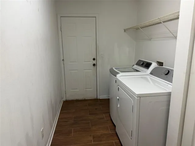 a utility room with dryer and washer