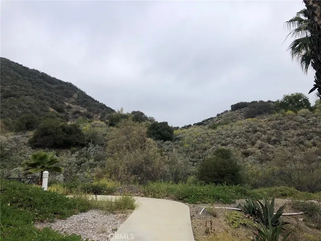 a room with wooden floor and furniture