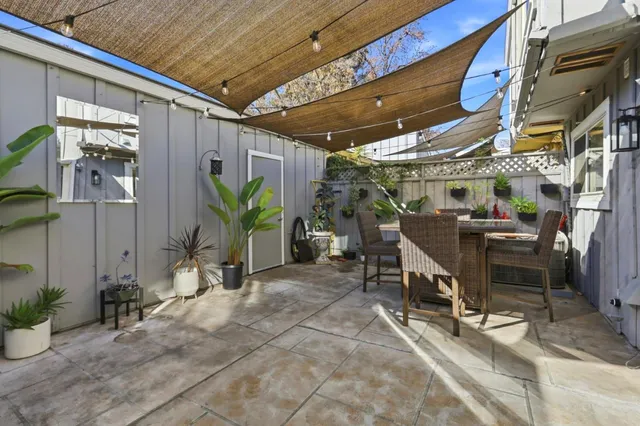 a view of a house with a street