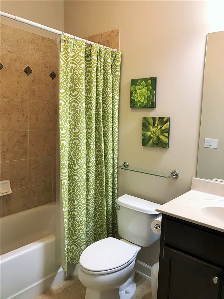11818 Lowery Ridge Drive Raleigh, NC 27614 - Photo 22 of 25 Full Bedroom & full bathroom on the 1st level. Bathroom