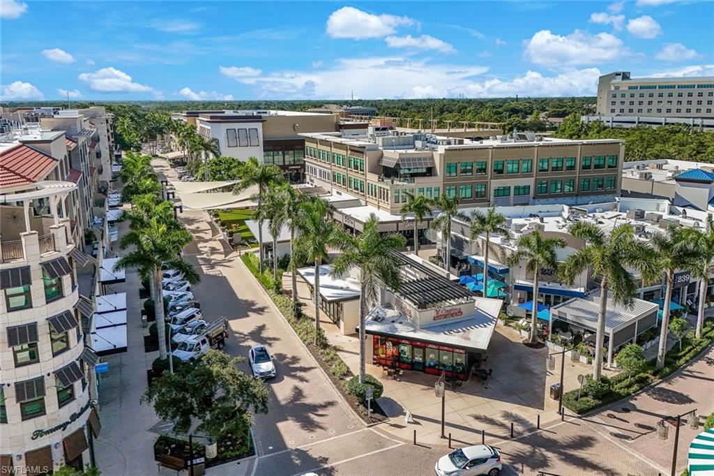 9123 Strada Place, Unit 7201 Naples, FL 34108 - Photo 46 of 50 a view of a city with tall buildings