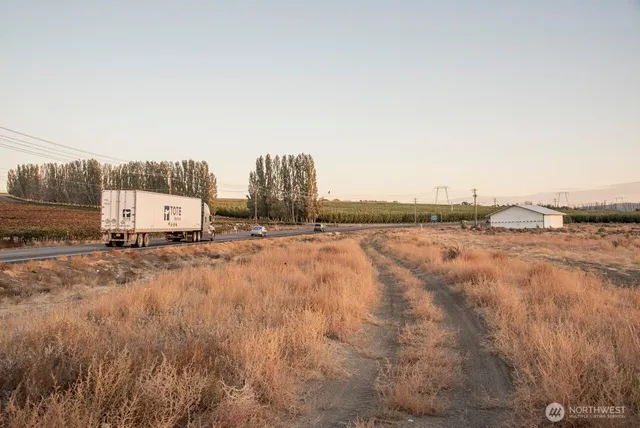 a view of a and mountain in a field