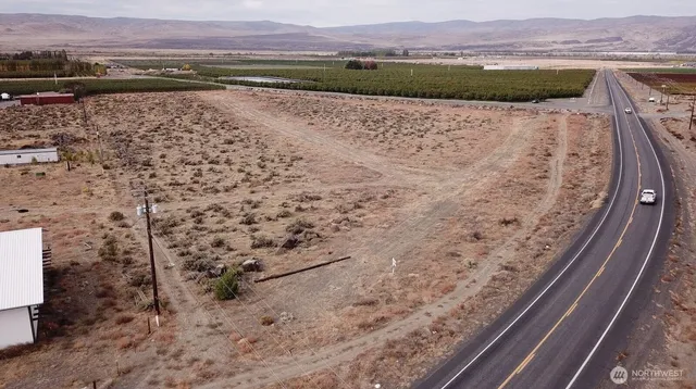 a view of a swimming pool with an ocean view