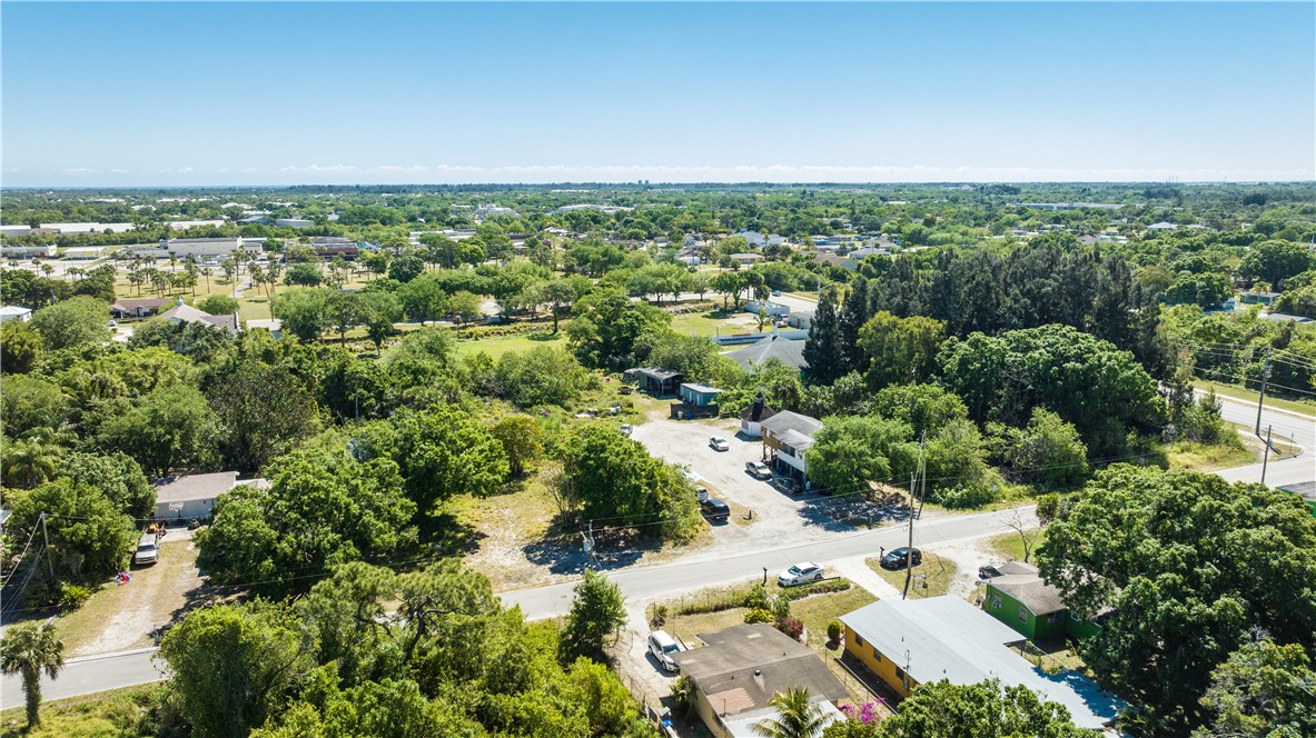 4560 32nd Avenue Vero Beach, FL 32967 - Photo 13 of 13 an aerial view of residential houses with outdoor space