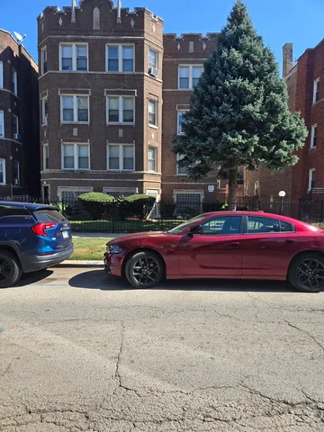a car parked in front of a building