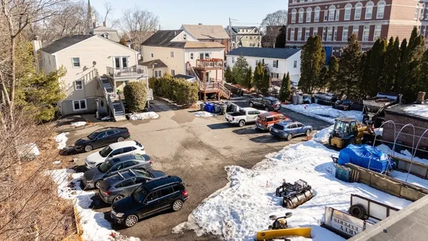 a view of a chairs and tables in the patio