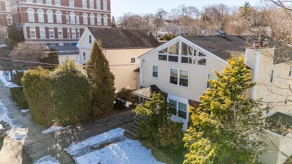 a view of a house with a yard