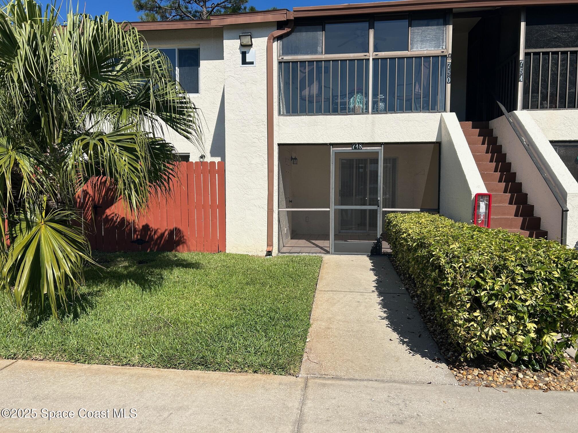 748 Ridge Club Drive, Unit 57 Melbourne, FL 32934 - Photo 1 of 22 front
